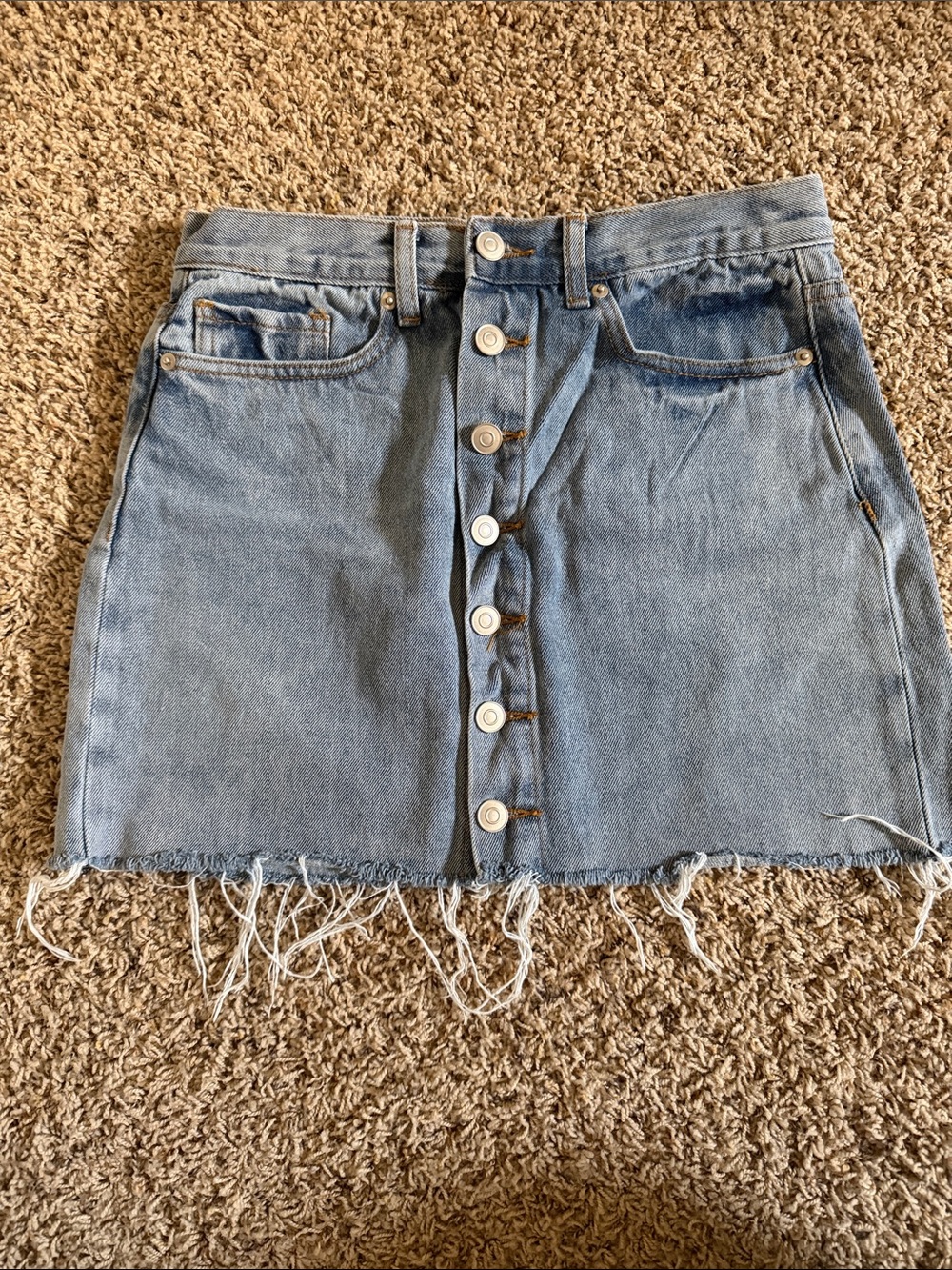 Button-Front Light Blue Denim Mini Skirt with Raw Hem